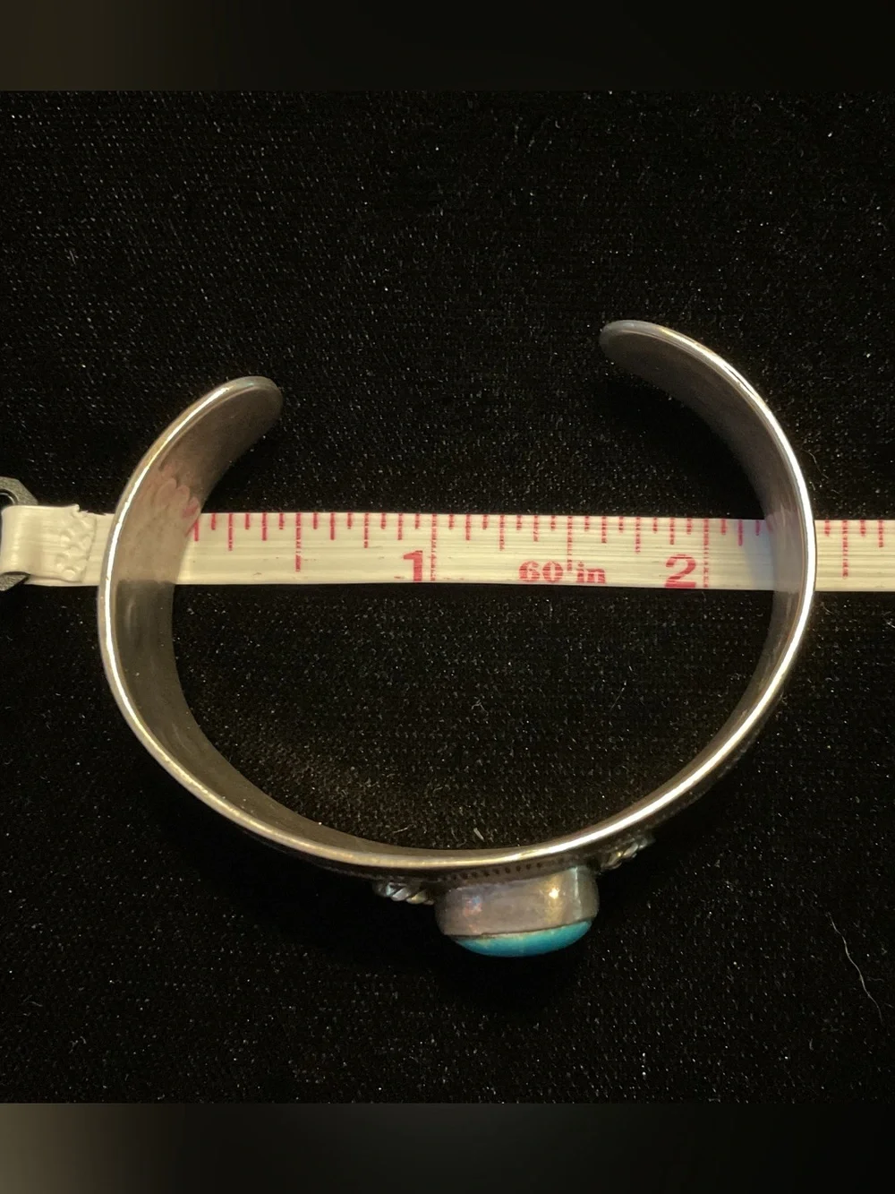 Vintage Navajo sterling 925 cuff bracelet featuring a central turquoise stone